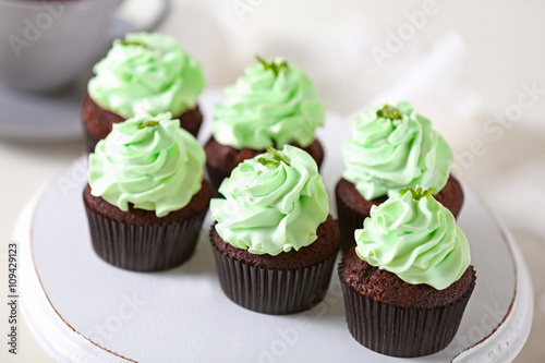 Beautiful chocolate cupcakes with mint cream