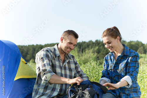 Couple camping in the forest