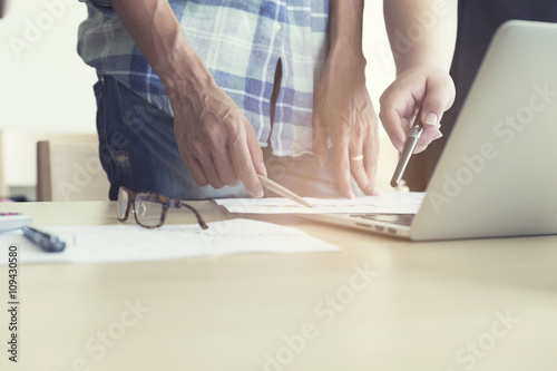 men working with business document and computer notebook, vintag