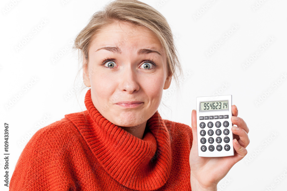 successful savings for funny young blond woman with calculator successful savings for funny young blond woman with calculator