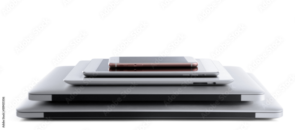 Stack of electronic devices isolated on a white background Stack of electronic devices isolated on a white background