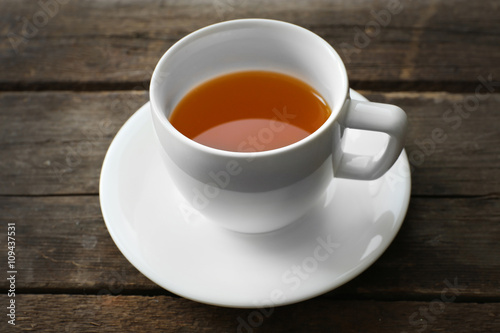 Cup of tea on wooden background