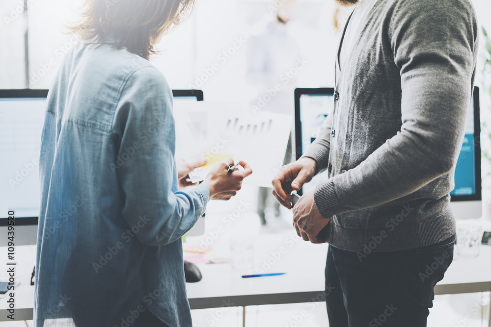 Business meeting picture.Photo woman showing papers chart.Managers crew working with new startup project.Idea presentation, analyze marketing plans, statistics document. Blurred background,film effect