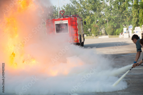 Firefighter fighting fire during training