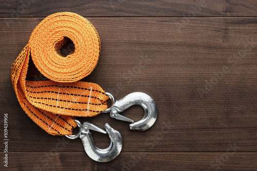 orange towing rope on the wooden table photo