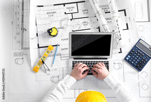 Architect sketching constru...