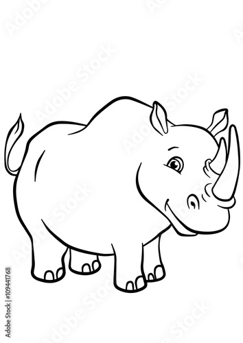 Cute rhinoceros stands and smiles.