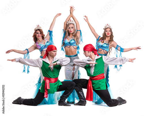 Fototapeta Naklejka Na Ścianę i Meble -  Carnival dancer team dressed as mermaids and pirates.  Isolated on white background in full length.