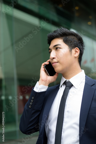 Indian businessman talking on phone