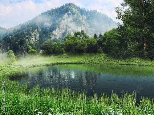 Górski krajobraz z jeziorem i zieloną łąką z wiosennymi kwiatami