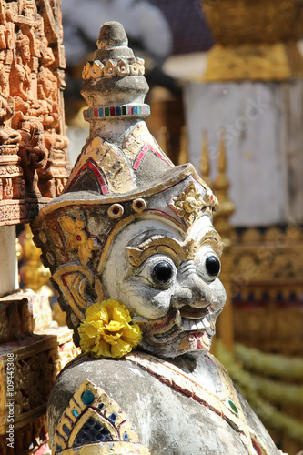 Traditional Thai style art at Wat Phra That Su Thon Mongkhon Khiri Samakkhi Tham, Phrae, Thailand photo