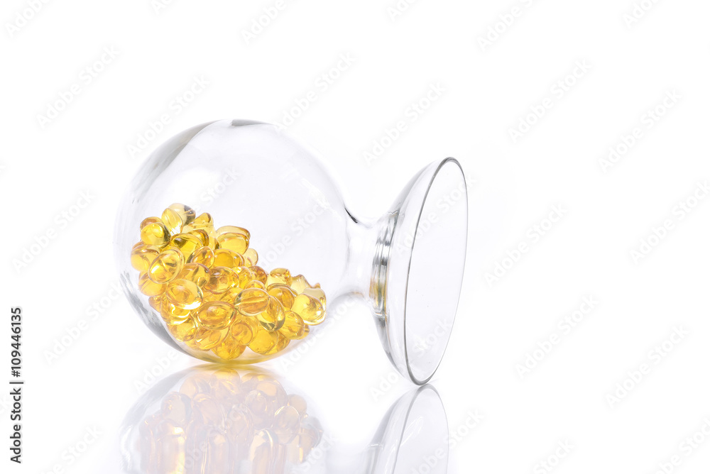 Fish oil capsule, Omega 3-6-9 fish oil yellow soft gels capsules on white background