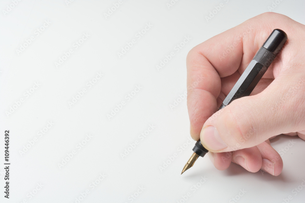 pen in the man's hand to signature pen in the man's hand to signature