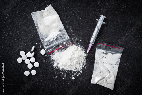 Hard drugs on dark table photo