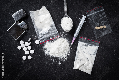 Hard drugs on dark table