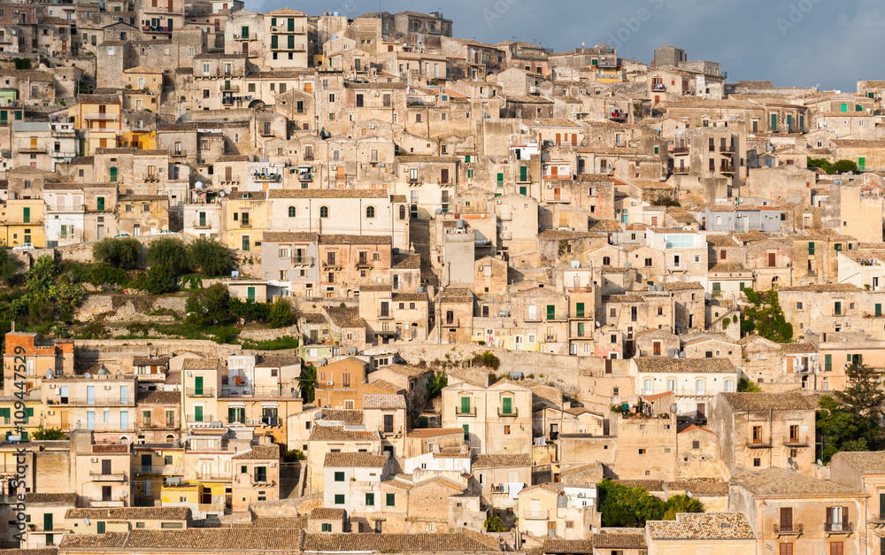 Houses packed in the old town of Modica, in Sicily