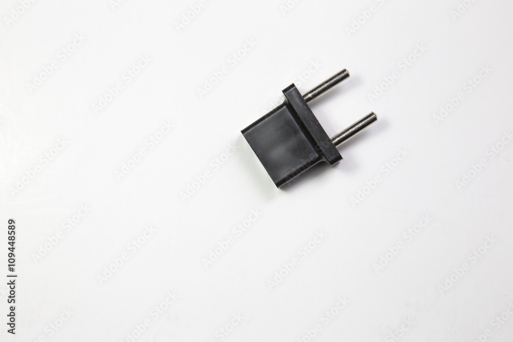 White EU plugs power adapters on a isolated on white background White EU plugs power adapters on a isolated on white background