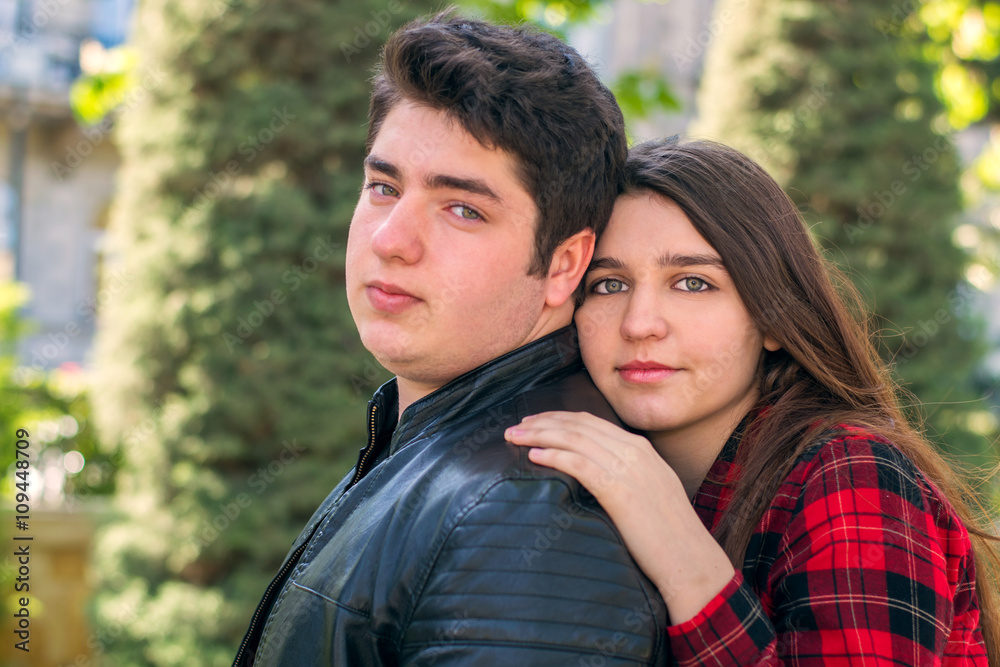 young beautiful couple relaxing outdoors young beautiful couple relaxing outdoors