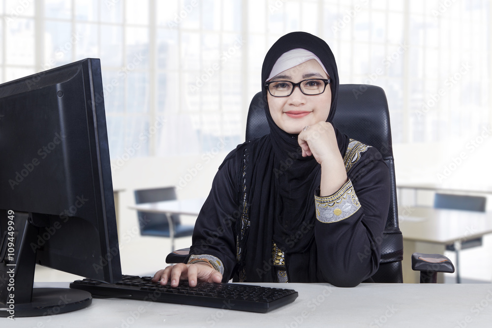 Arabian businesswoman sits at workplace Arabian businesswoman sits at workplace