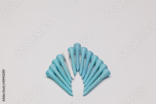 Golf tees on the white background