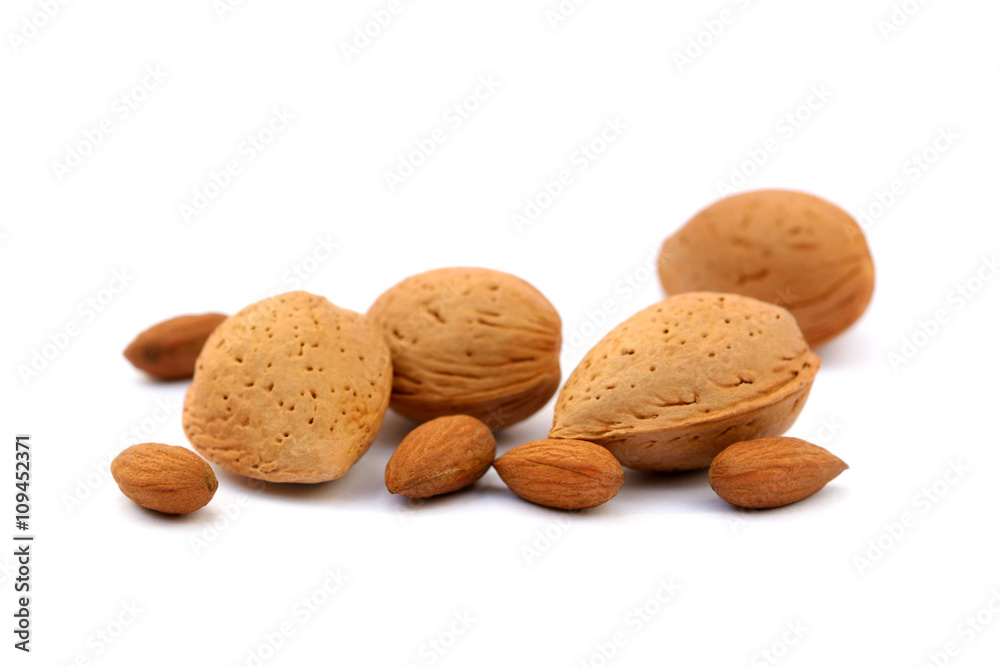 Fresh almonds in shells isolated on white background Fresh almonds in shells isolated on white background