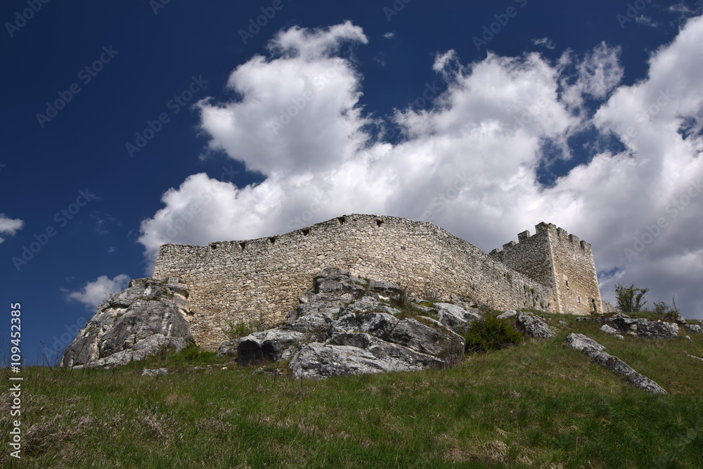 Wall and tower of Spis Castle, Slovakia at summer day