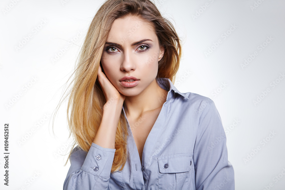 Portrait of wonderful young blonde woman with long hair looking Portrait of wonderful young blonde woman with long hair looking