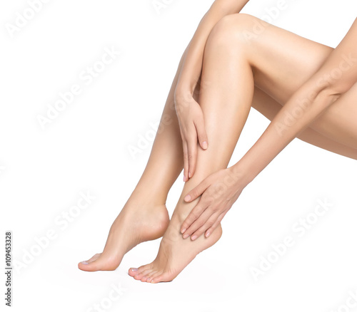 woman legs isolated on white. Depilation or another healths concept © Glebstock