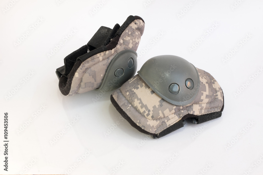 Pair of knee protectors isolated on a white background Pair of knee protectors isolated on a white background