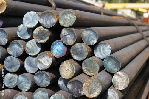 Metall rolled bar. Steel round. Carbon bar. Hot rolled ferrum. Rounded metal. Circle bar.