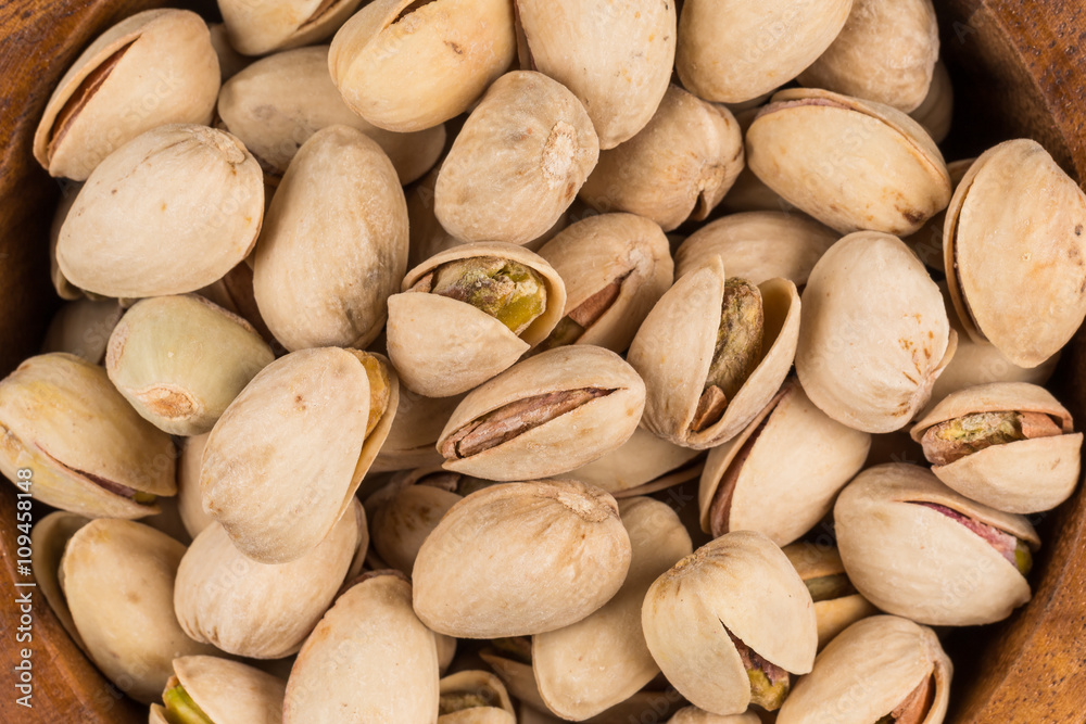 Pistachio nuts in bowl Pistachio nuts in bowl