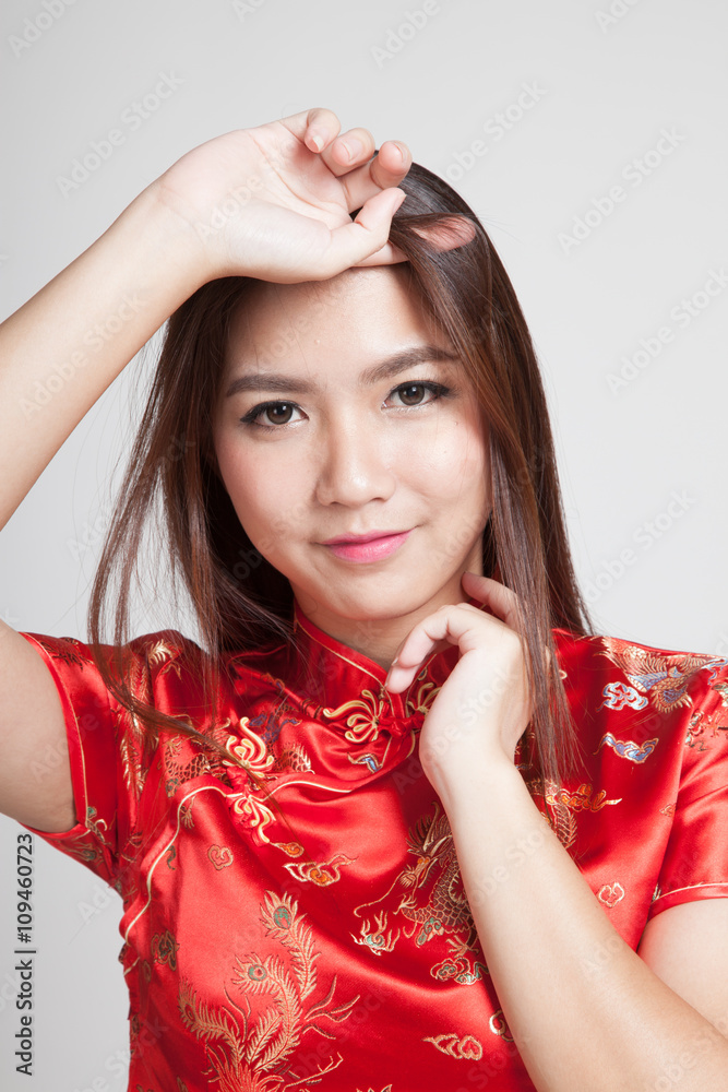 Asian girl in chinese cheongsam dress Asian girl in chinese cheongsam dress