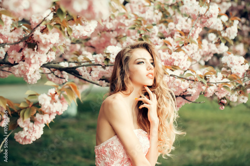 Fashionable woman in blossom