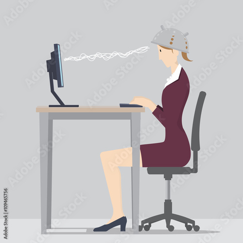 Against Mind Control Concept. Woman sitting at desk wearing colander to protect her from mind control.