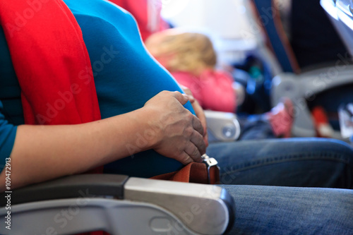 pregnant woman travel by plane