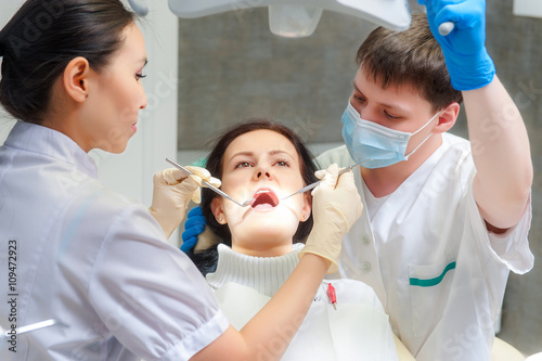 Female patient with open mouth photo