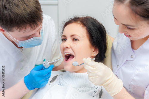 Female patient with open mouth photo