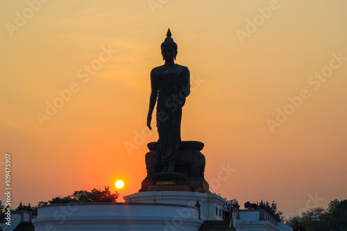 Buddha statue at Phutthamonthon(Buddhist park in Phutthamonthon district,Nakhon Pathom Province of Thailand) during sunset