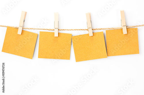 Notice card, brown paper and wood clips