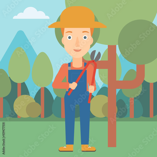 Farmer with pruner in garden.