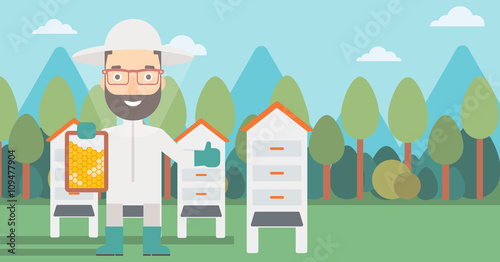 Bee-keeper at apiary.