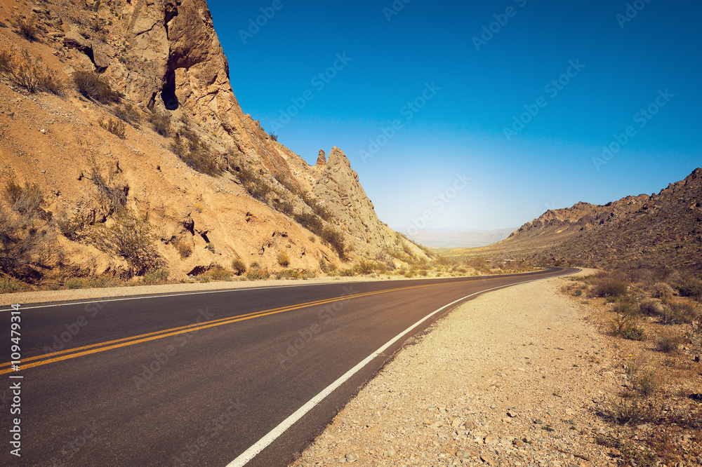 Road in desert, Valley of Fire State Park, southern Nevada, USA Road in desert, Valley of Fire State Park, southern Nevada, USA