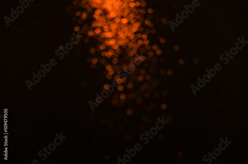 abstract bokeh light on dark background