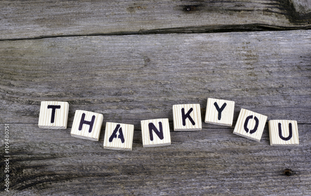 Fototapeta premium Text: Thankyou from wooden letters on wooden background