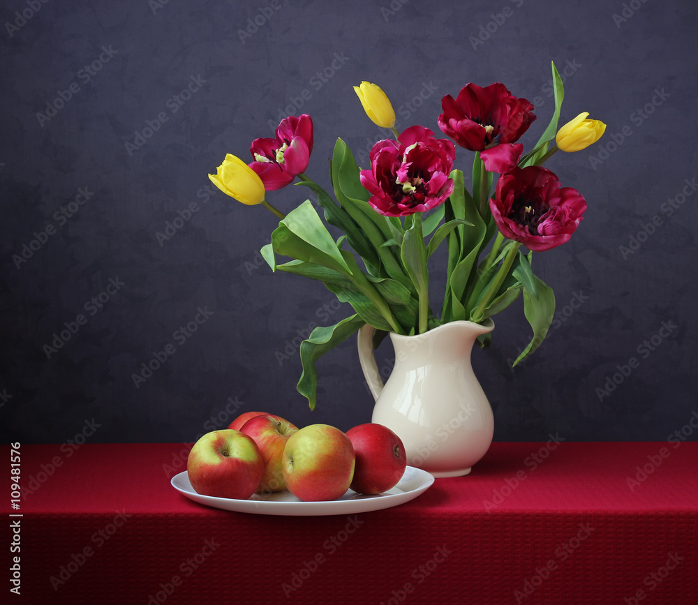 Still life with a bouquet of tulips n a white pitcher