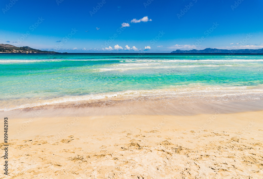 Beach sea waves with turquoise blue water