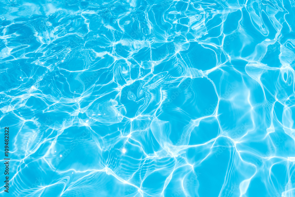 Ripple Water in swimming pool witn sun reflection