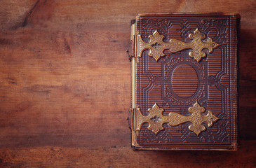 top view of antique book cover, with brass clasps