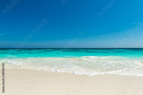 Beautiful beach and tropical sea  Wave of the sea on the sand beach