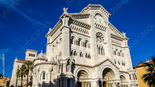 Facade of cathedral in Monaco on blue sky background